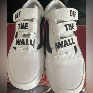 White old school vans with Velcro straps